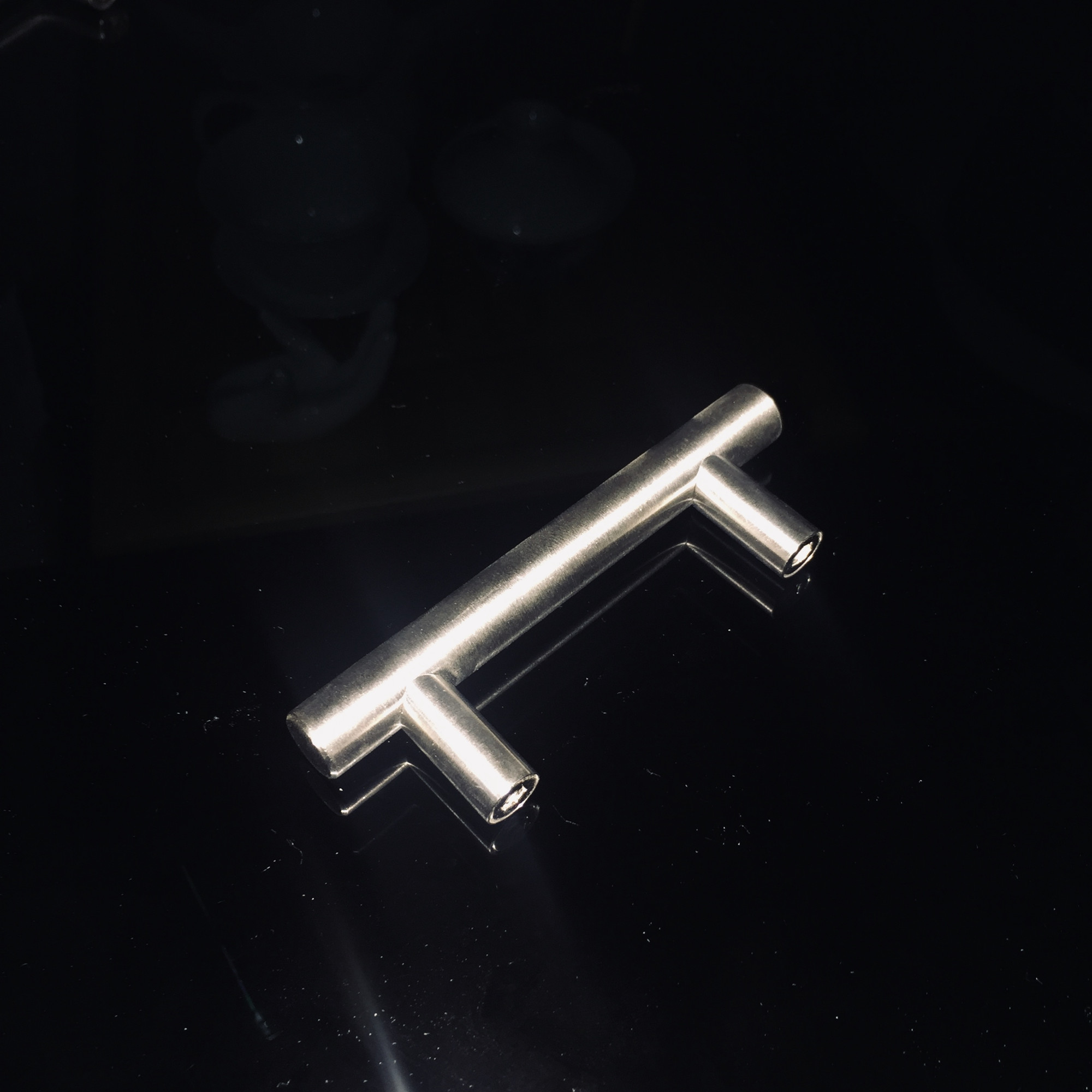 Tache nickel