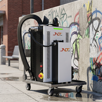 Machine de décapage de rouille au laser portable 300W pour le nettoyage industriel quotidien des sols, élimination des taches de peinture et des déversements d'huile sur le béton