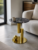 Table d'appoint ronde en pierre microcristalline noire avec piétement en acier inoxydable doré et accent sphérique pour hôtel, salon, OEM
