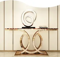 Table basse moderne de luxe avec base en acier inoxydable doré et dessus en marbre, table d'entrée étroite