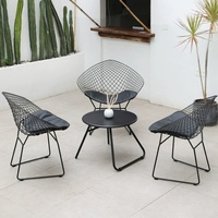 Ensemble table et chaises de salle à manger de forme géométrique moderne, cadre en fer forgé, pieds en alliage d'aluminium, tissu imperméable, finition résistante aux rayures