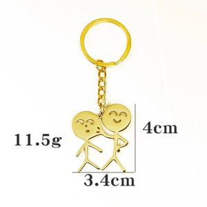 Divertido y parodista colgante para bolso de personaje de dibujos animados, llavero de acero inoxidable al por mayor con diseño de pareja de caras que se pellizcan y mecha de cerillas - Product Image 3