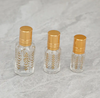 Top Grade 3ml 6ml 12ml vide doré octogonal huile essentielle rouleau bouteille feuille-motif verre rouleau sur bouteille de parfum