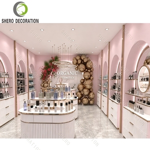 Étagères de présentation cosmétiques en or rose de luxe, design d'intérieur de parfumerie, aménagement de boutique de cosmétiques bio, vitrine arquée - Product Image 2