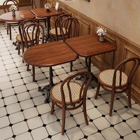 Tables et chaises pliantes en bois massif de style chinois moderne, personnalisables pour usage commercial dans les cafés, restaurants, salons de thé, boulangeries