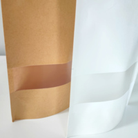 Venta al por mayor de papel Kraft mate, bolsa de pie con cremallera y ventana, embalaje de papel para alimentos, café, aperitivos, semillas