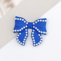 Boucles et attaches pour chaussures en plastique souple PVC, métal, caoutchouc, strass, aglets, chaînes et fleurs