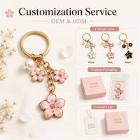 Llavero de aleación de zinc con flor de cerezo esmaltada, dulce y lindo, con perlas, para bolso, mochila, cartera o teléfono