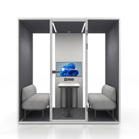 Cabine de travail modulaire intérieure moderne avec table, canapé et éclairage LED pour discussion d'équipe, pod de réunion insonorisé
