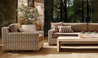 Canapé d'extérieur en osier élégant, résistant aux intempéries, avec cadre tressé à la main et coussins beiges, mobilier de salon modulaire pour jardin