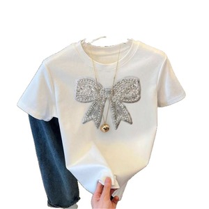 T-shirt casual all'ingrosso 2026 a maniche corte <span class=keywords><strong>con</strong></span> scollo rotondo, fiocco, <span class=keywords><strong>paillettes</strong></span> e stampa motivo burro, traspirante e tinta unita - Product Image 5