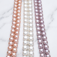 Chaîne de perles en forme de bouton H.WEN 3-4A (3-10 mm) ; Perles volumineuses de type « boule » avec fonds plats et trous percés au centre.