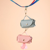 Distributeur de sacs à déjections canines en cuir de luxe, portable et élégant pour les voyages