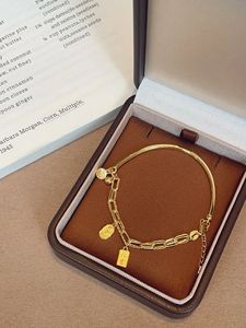 สร้อยข้อมือทองคำแท้ 24K 999 ยี่ห้อซินฟลาย ลักซ์ลรี่ จิวเวลรี่ แบบครึ่งวงกลมครึ่งสายโซ่ น้ำหนักประมาณ 8.5 กรัม - Product Image 2