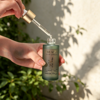 Emballage de soins de la peau en verre transparent de luxe, flacon de lotion en verre de 50 ml et 60 ml avec pompe compte-gouttes en verre