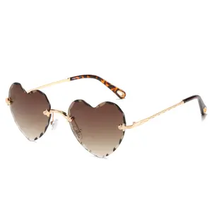 Factory Outlet Fashion Retro Frameless heart shaped sunglass Trend Party Men and Women Sunglasses for 2022