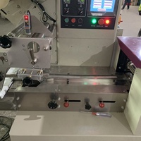 Machine d'emballage automatique pour barres de crème glacée, bâtonnets de glace et sucettes glacées (emballage oreiller)