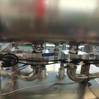 Machine de remplissage d'huile à haute viscosité entièrement automatique électrique pour applications chimiques et de boissons, emballage en sachet et en fût, moteur PLC