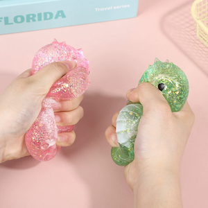 Nouvelle poupée anti-stress en TPR, dinosaure amusant à presser, avec paillettes, en forme de dessin animé, jouet amusant pour enfants pour déstresser - Product Image 1