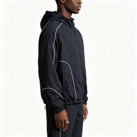 Veste coupe-vent en nylon softshell Gorpcore avec panneaux en mesh, style techwear minimaliste et passepoil contrastant, 260 g/m²