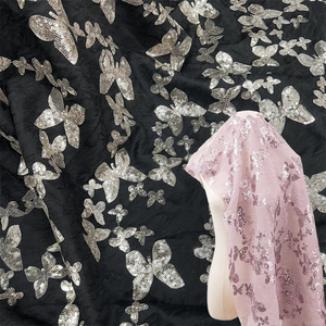 Fabricante de China, precio al por mayor, patrón de mariposa, encaje bordado, lentejuelas tejidas, tela de poliéster 100% para zapatos, textiles para el hogar - Product Image 1