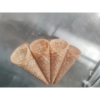 Machine automatique pour la fabrication de rouleaux d'œufs croustillants, de bâtonnets de gaufres manuels, de crêpes, de cornets de glace chinois et de mini gaufres de maïs