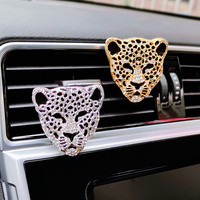 Diffuseur d'huiles essentielles pour voiture Q-102, clip de parfum pour grille d'aération, design créatif léopard en cristal, désodorisant et aromathérapie automobile