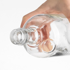 Botellas Clásicas de Vidrio de 500 ml y 750 ml, Venta al por Mayor, Botellas Vacías Transparentes Redondas para Vodka, Whisky y Tequila - Product Image 4