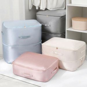 Bolsas de Almacenamiento Auto-Compresibles a Prueba de Polvo para Organizar Edredones y Ropa - Product Image 1