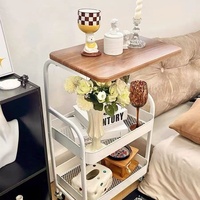 Table d'appoint mobile avec panier de rangement à 2 niveaux, table d'appoint roulante, structure en métal, roulettes verrouillables, table basse mobile pour salon