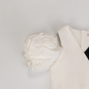 Vestido Formal para Niñas con Diseño de Cruz en Blanco y Negro - Product Image 4