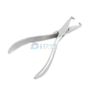 Oliver Bande Enlevant La Pince Orthodontie Dentaire Chirurgical instruments De Laboratoire Dentaire - Product Image 1