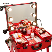 Valise de maquillage portable en aluminium rouge tendance avec miroir LED, poignée souple et fermeture à clapet
