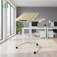 Bureau mobile pneumatique réglable en hauteur pour le télétravail, table pour ordinateur portable assis-debout avec roulettes