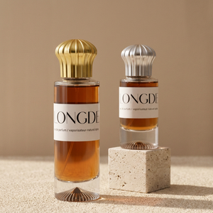 Flacon de parfum en verre vide élégant avec pulvérisateur à sertir, 30ml 50ml 100ml, cylindrique transparent avec capuchon doré et argenté - Product Image 1