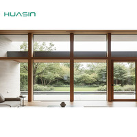 Porte en aluminium Huasin ODM, norme américaine 2025, moderne, extérieure, drainage dissimulé, finition bois personnalisée, résistance à la pression du vent