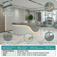 Bureau de réception moderne de luxe personnalisé avec effet marbre incurvé et éclairage LED intégré pour hall d'hôtel, bureau d'entreprise, salon de beauté