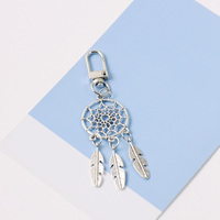Porte-clés attrape-rêves très vendus, porte-bonheur pour voiture, porte-clés en acier inoxydable, pendentif en métal 3D avec pompon en feuille