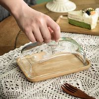 Dôme en verre sur mesure avec base en bois