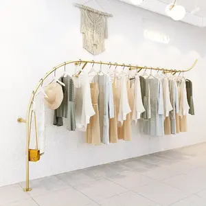 Moda altın bez elbise rafı butik giyim standı giyim mağazası için paslanmaz çelik duvara monte giysi rafı