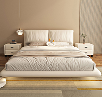 Lit flottant inclinable minimaliste italien Style crème moderne Petite oreille d'éléphant Suspendu Ensembles de chambre à coucher en cuir Nappa Chambre à coucher