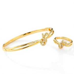 Ensemble de bijoux en cuivre plaqué or 18 carats avec nœud XOXO et zircon, bracelet et bague ajustables, ensemble cadeau pour mariage, fiançailles, fête, fait main - Product Image 4
