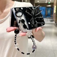 Coque de téléphone Duoable à pois scintillants avec chaîne de bracelet à nœud papillon pour femmes, housse mignonne antichoc pour IPhone 18 Duo iPhone Ultra Duo Fold