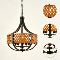 Lustre contemporain en fer noir mat avec cadre en rotin tissé à la main, lampe suspendue creuse pour restaurant