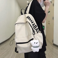 Sac à dos unisexe léger en denim au design tendance pour étudiants et lycéens, avec fermeture éclair et doublure en polyester