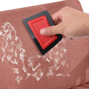 เครื่องกำจัดขนสัตว์เลี้ยงแบบพกพา ABS สำหรับโซฟา เสื้อผ้า และขนสัตว์ - Product Image 1