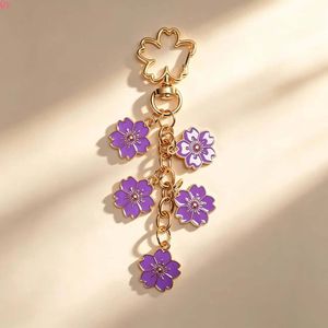 QQ New Enamel Flower <b>Keychain</b> Pendant Cherry Blossom <b>Keychain</b> High-end Design Key Ring Wholesale in Stock - Product Image 4