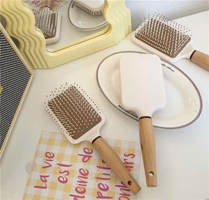 Cepillo de masaje con cojín de aire y mango de madera, antiestático, desenredante, para cabello rizado, de diseño sencillo y moderno - Product Image 4