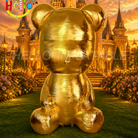 Sculpture géante gonflable en or métallique d'un ours assis, accessoire décoratif pour centre commercial de luxe