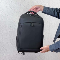 Sac à dos d'affaires pour homme, grande capacité, imperméable, durable, avec logo personnalisé, nouveau sac à dos de voyage simple de couleur unie avec port USB